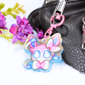 Llavero acrílico con la cara de Sylveon.