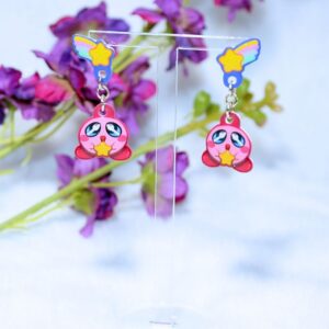 Pendientes de botón inspirados en Kirby, con una estrella y un arcoíris.