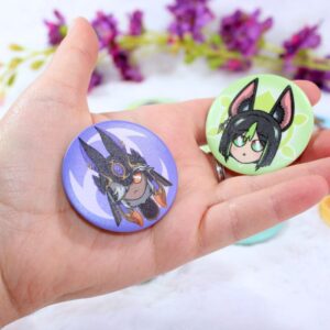 Chapas inspiradas en los personajes de Genshin Impact con efecto mate.